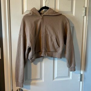 Tan TNA cropped fleece zip up